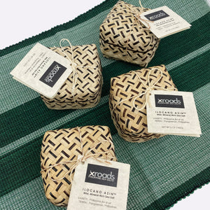 Green woven placements with boxes of Ilocano salt